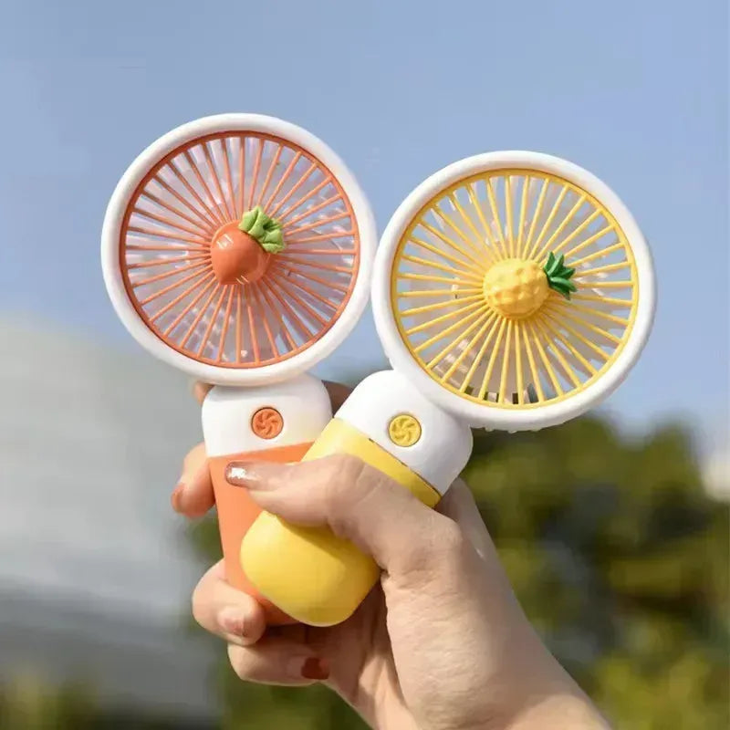 Mini Handheld Fan with Carrot Accent, Portable & Lightweight Cooling Device
